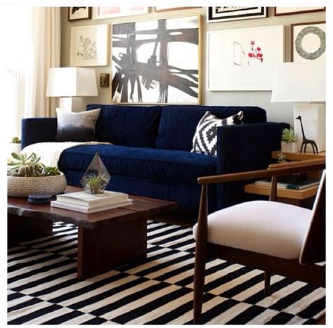 living rooms with navy blue couches